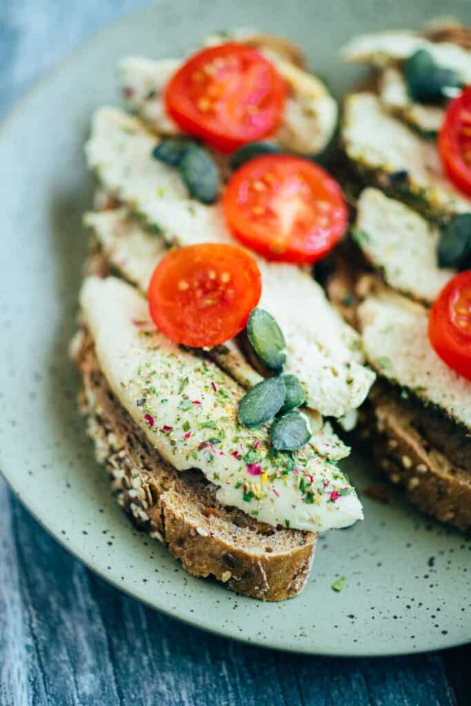 Vegan cheese with herb coating