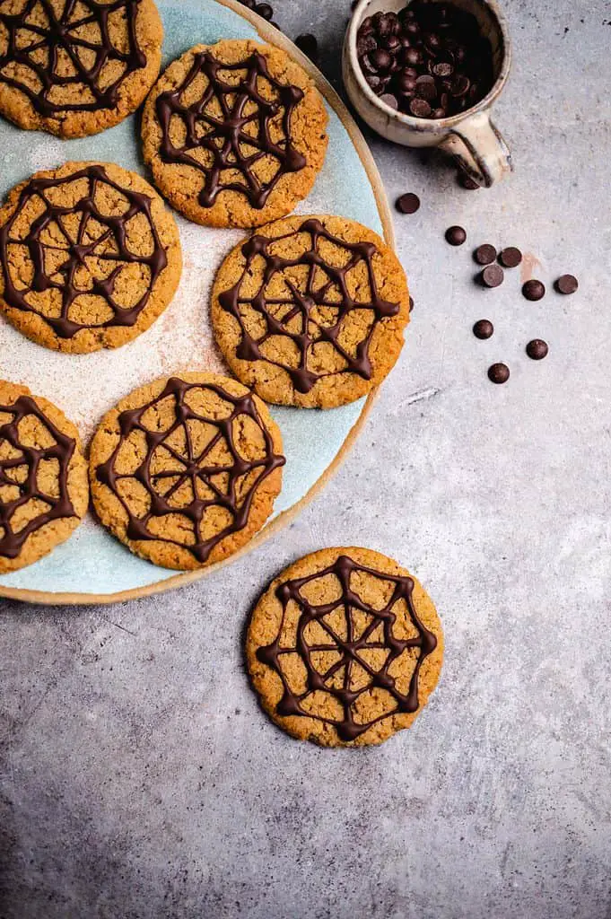 Vegan Halloween cookies with spider web pattern