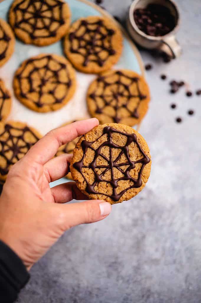 Vegan Halloween cookies with spider web pattern